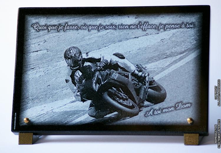 grave plaque with engraving of a motorcyclist