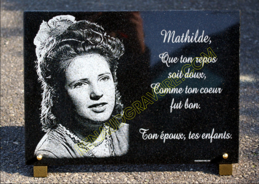 very beautiful portrait engraved on a granite grave plaque