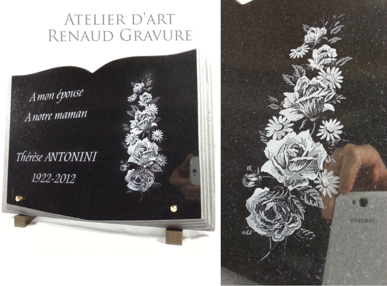 Bouquet of roses engraved on a funeral plaque book.